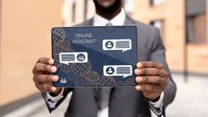 AI for Customer Service. Tablet displaying online assistant, chatbot, and customer support icons.