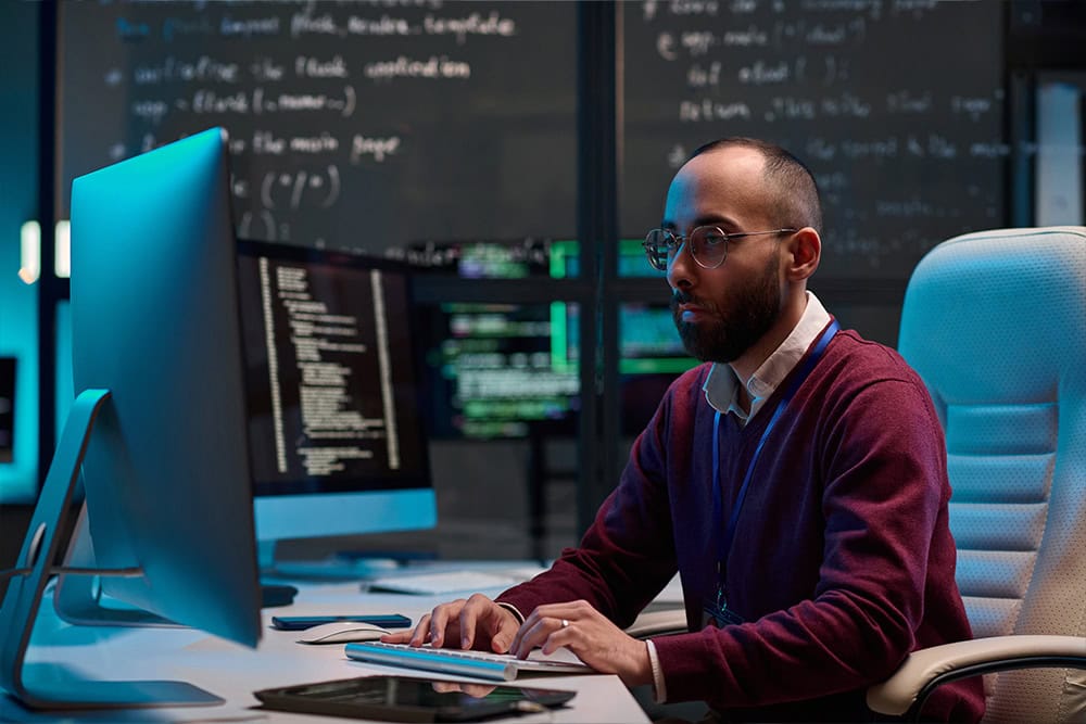 Java Data Structures and Algorithms: Programmer coding on computer. Software development, data analysis.