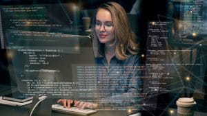 Javanista to Java Master: Woman coding Java. Developer working on computer with code overlay. Programming concept.