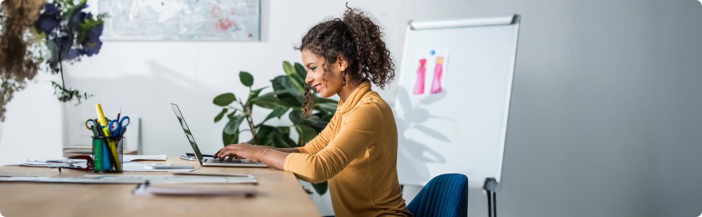 Woman learning online, using laptop. Remote learning, online courses, and education concept.