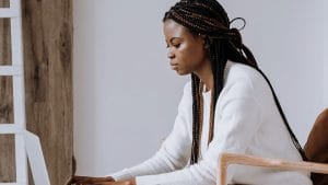 Personal Assistant: Woman using laptop. Microsoft 365 Certified Fundamentals course. Office skills training.